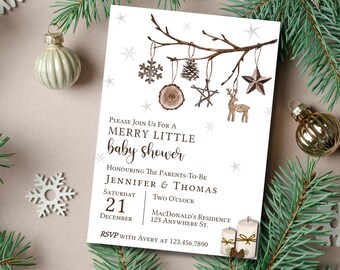 May include: A white baby shower invitation with a rustic winter theme. The invitation features a branch with ornaments, a reindeer, and the text "Please join us for a Merry Little Baby Shower". The invitation also includes the names Jennifer & Thomas, the date Saturday, 21 December, the time Two O'Clock, the location MacDonald's Residence, 123 Anywhere St., and the RSVP information.