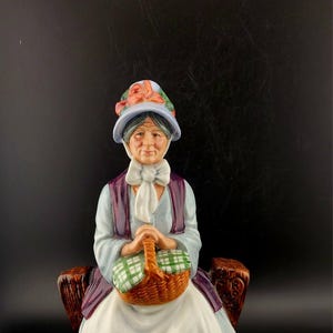 Royal Doulton figurine, Rest a while, Royal Doulton figurine, Royal Daulton figurine, orange lady Royal Doulton figurine, made in England