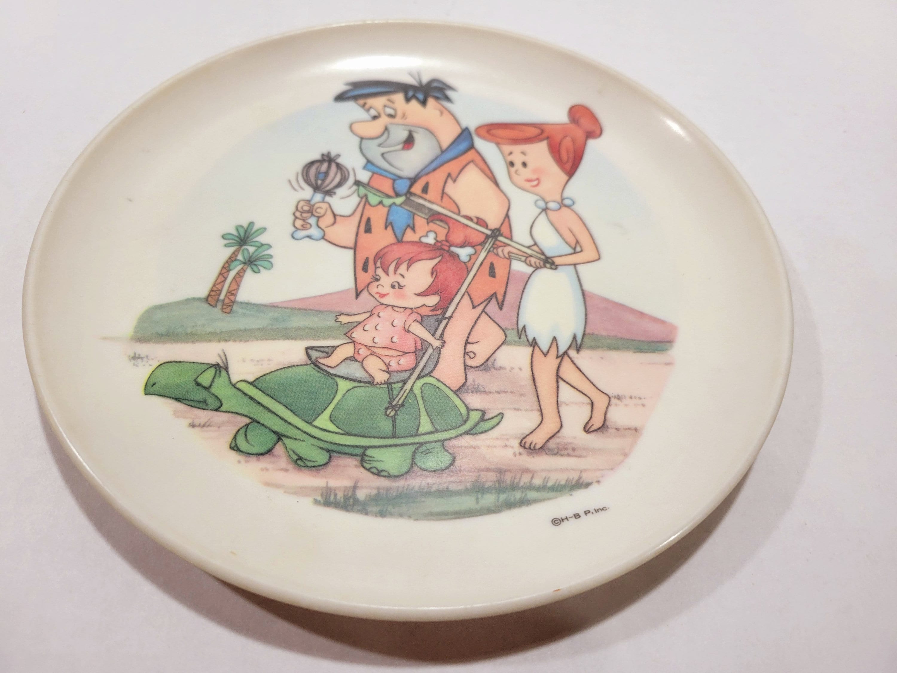 vintage flintstones plates his wife shares