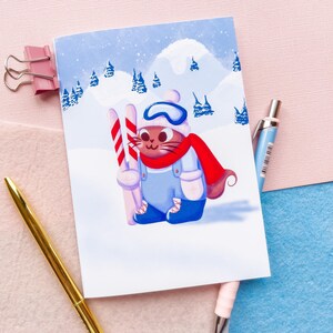 Biglietto di auguri invernale con gatto sciatore carino - Biglietto di auguri fatto a mano, illustrazione di animali stravaganti per gli amanti dei gatti, biglietto di Natale