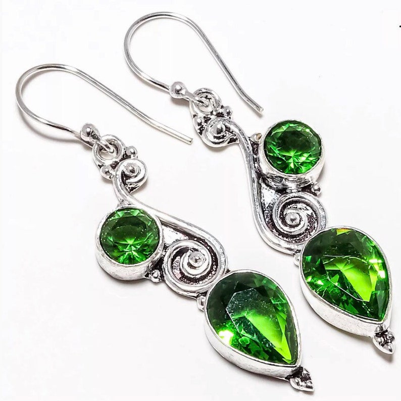 Green Peridot set in 925 silver These beauties are 2.15 long