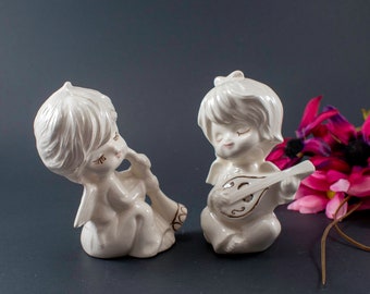 Adorable Porcelain Angels Playing Instruments. Ceramic Girl And Boy Angel figurines. Christmas angels