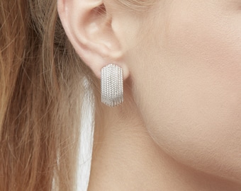 Platinum Textured Curve Clip on Earrings