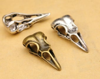 30 stuks 32 mm x 15 mm antiekzilver/antiek bronzen schedel vogel hanger bedel