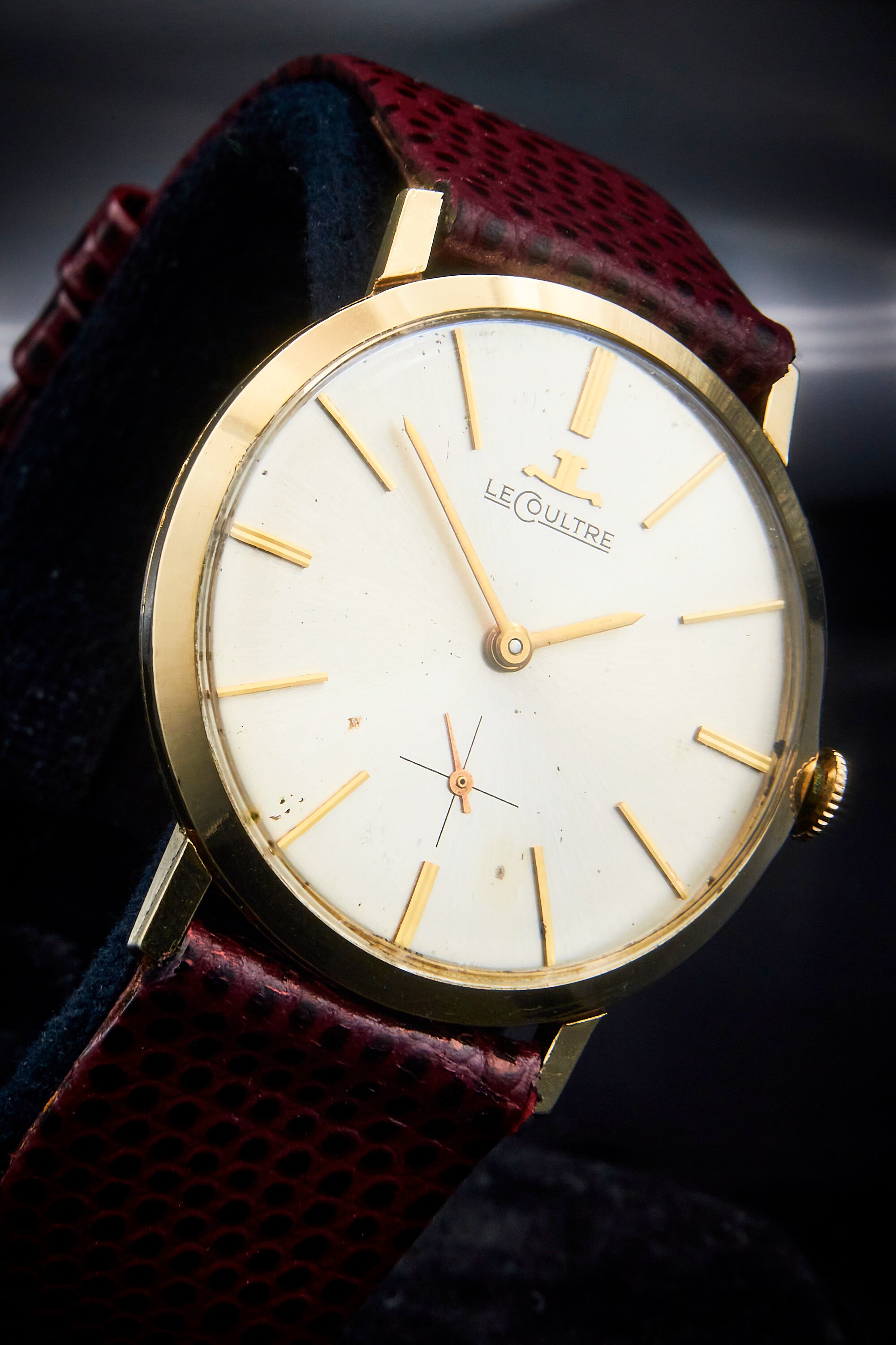 Lecoultre 14k gold watch top