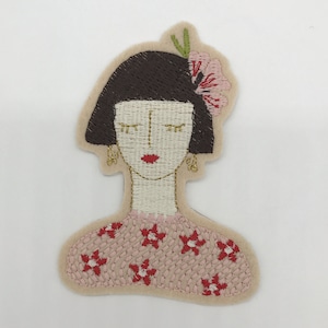 Patch for ironing or sewing, patch or iron-on patch for clothing or textiles, woman with gold earring patch