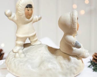 Vintage Porcelain Eskimo Figure Throwing Snowballs