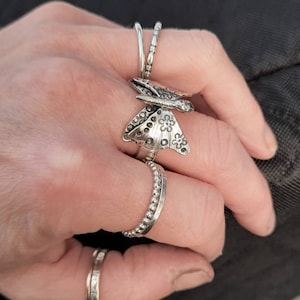 A gorgeous silver butterfly ring.