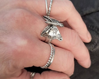 A gorgeous silver butterfly ring.