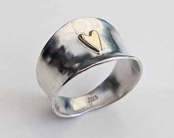 A Funky, Chunky Gold Heart Silver Ring.