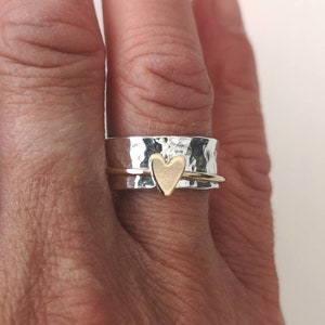 9ct gold heart spinner ring.