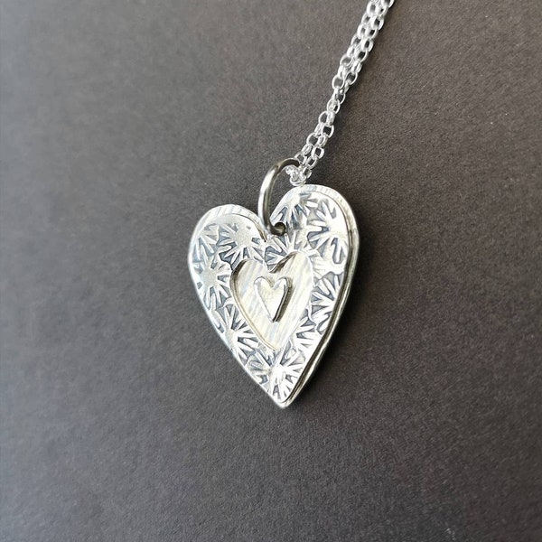 Four In One Silver Heart Necklace. ( SEE PHOTOS)