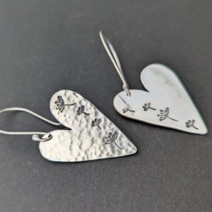 Some very, very lovely indeed hammered dandelion print silver earrings.