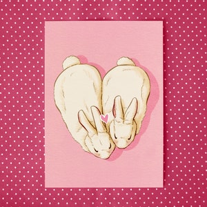 Kuschelnde Kaninchen Postkarte "Lovebuns" – Herzförmige A6 Grußkarte, Handillustrierte süße Karte auf Recyclingpapier Nachhaltig & liebevoll