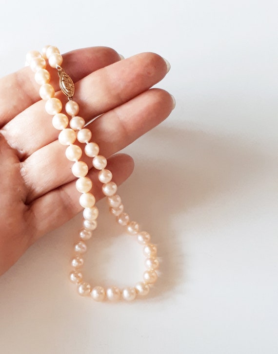 Pearl necklace hotsell safety clasp
