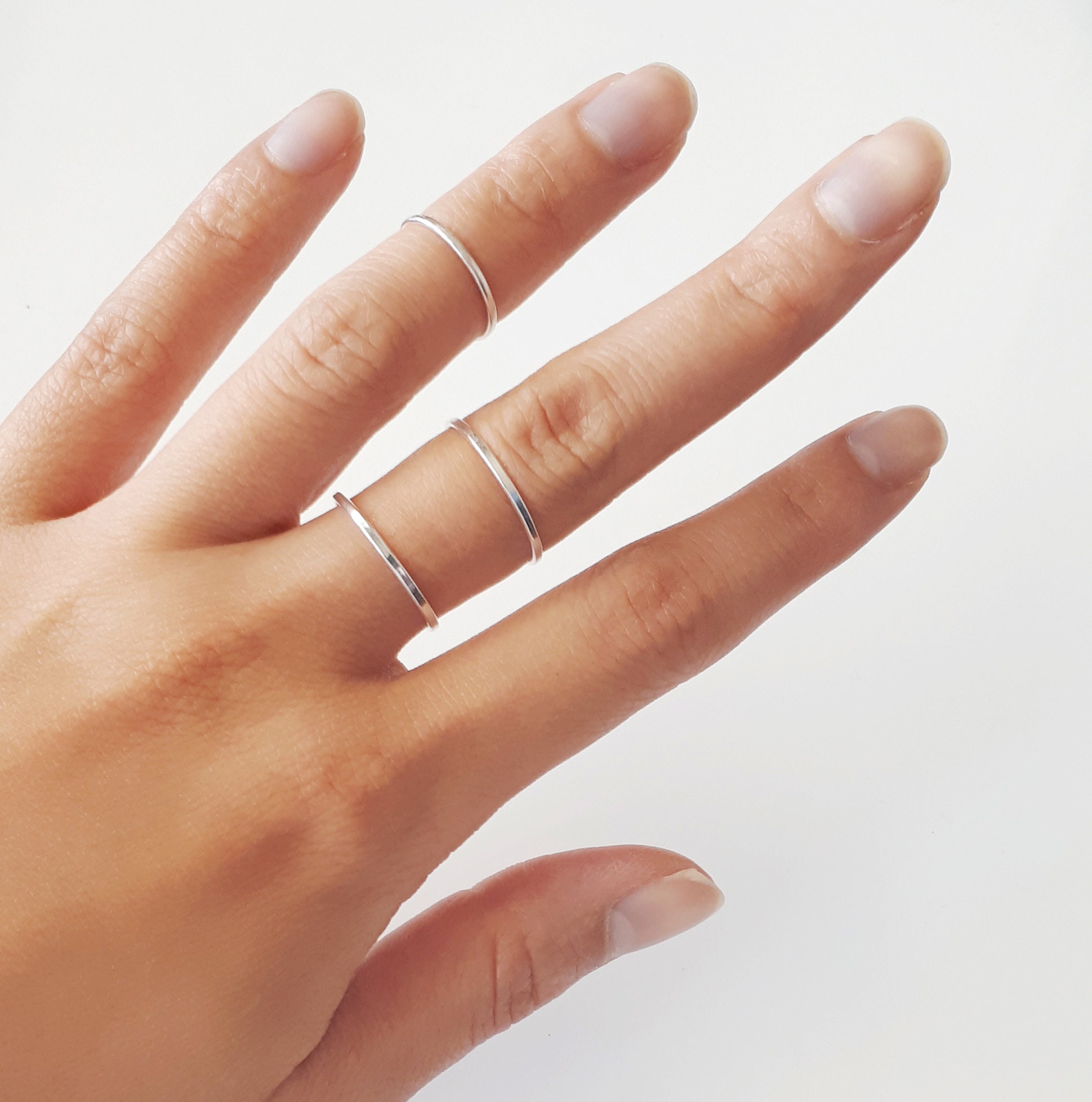 Thin and delicate silver ring with pink cubics zirconia by Elsa Lee