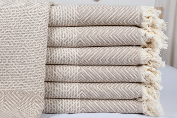 Dark beige throw shop