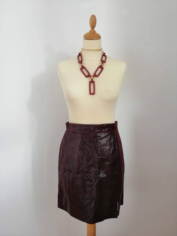 pleated green wool skirt