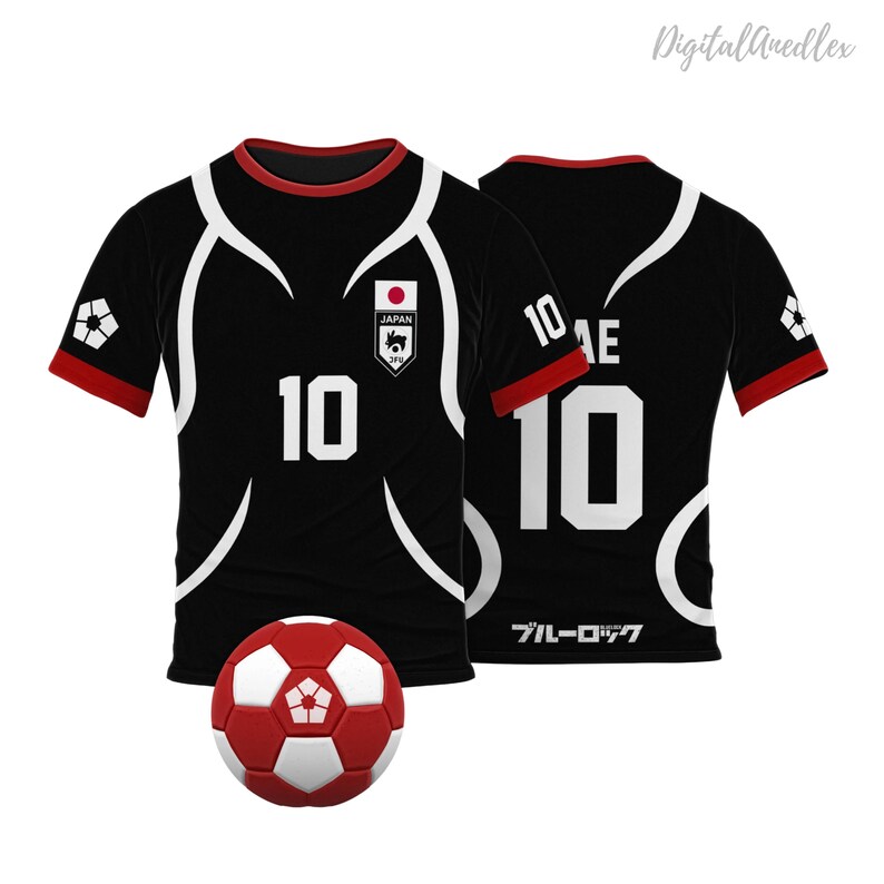 May include: Black and white soccer jersey with red trim. The jersey has the number 10 on the front and back. The front of the jersey also has a small Japan flag patch with the text "JAPAN" and a wolf logo. The back of the jersey has the text "ブルーロック" in Japanese. A red and white soccer ball is in the foreground.
