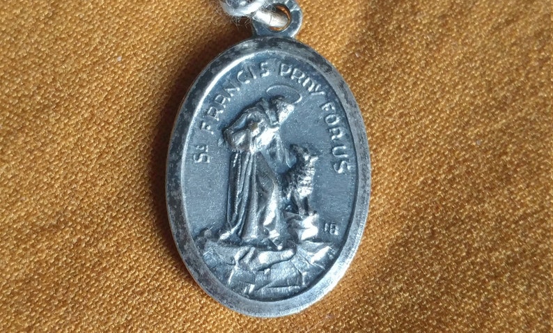 Religious metal charms and earrings Sterling