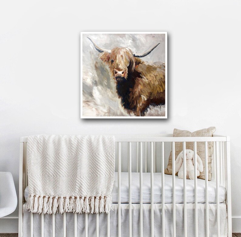 May include: A painting of a brown and white Highland cow with long horns. The cow is looking directly at the viewer with a gentle expression. The background is a light gray with brushstrokes.