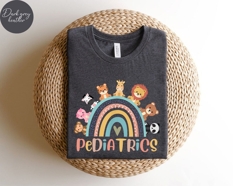 May include: Dark grey heather t-shirt with a rainbow and animals on it. The text "PEDIATRICS" is below the rainbow.