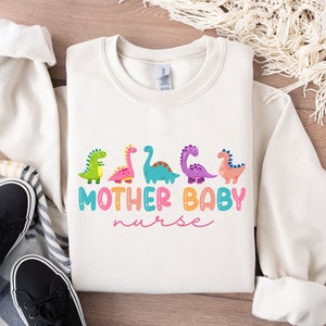 Mother Baby Nurse Dinosaur Sweatshirt, Postpartum Nurse Shirt, NICU Nurse Gift, Postpartum RN Crewneck, Baby Nurse Sweatshirt, Ob Nurse Tee