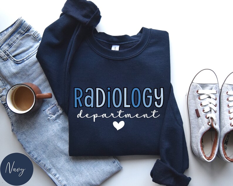 May include: Navy blue sweatshirt with the text "RADIOLOGY department" in blue gradient lettering with a white heart.