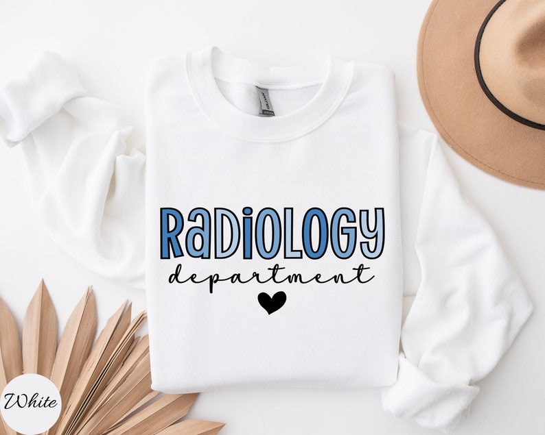 May include: White sweatshirt with the text "Radiology department" in blue and black lettering with a black heart.