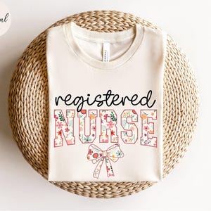 Coquette Bow Floral Registered Nurse Shirt, RN TShirt for Registered Nurse, Nursing T-Shirt for Nurse, Registered Nurse, RN Graduation Gift