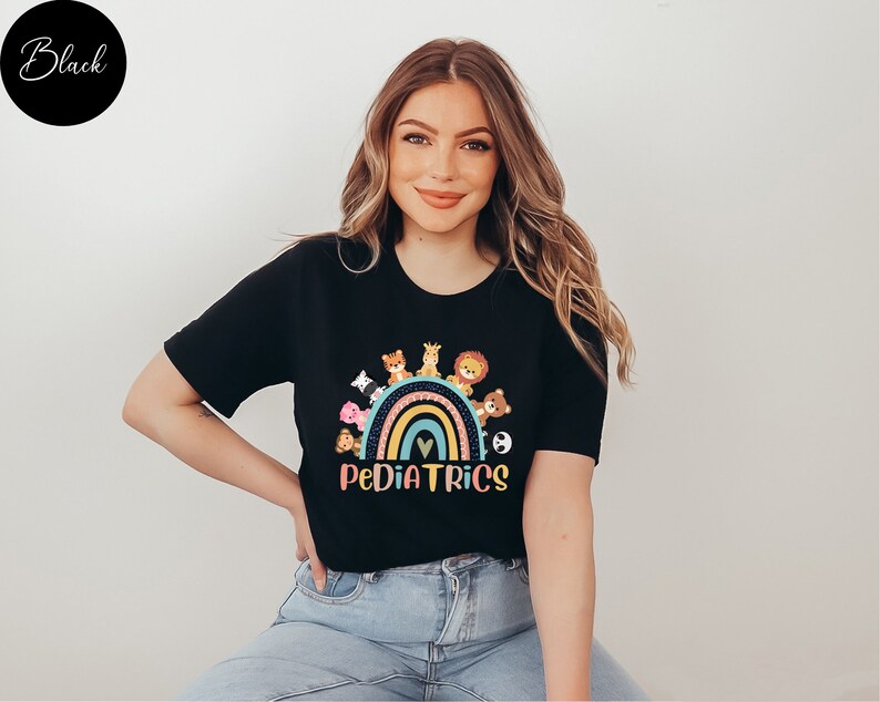 May include: Black t-shirt with a rainbow and animals on it. The text "PEDIATRICS" is below the rainbow.