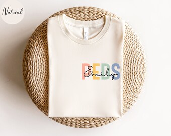 Personalisierte Kinderpflegerin Shirt, benutzerdefinierte Kinderpflegerin Tshirt, Kinderpflegerin T-shirt, Krankenschwester Wertschätzung Geschenk, Peds Krankenschwester T-Shirt