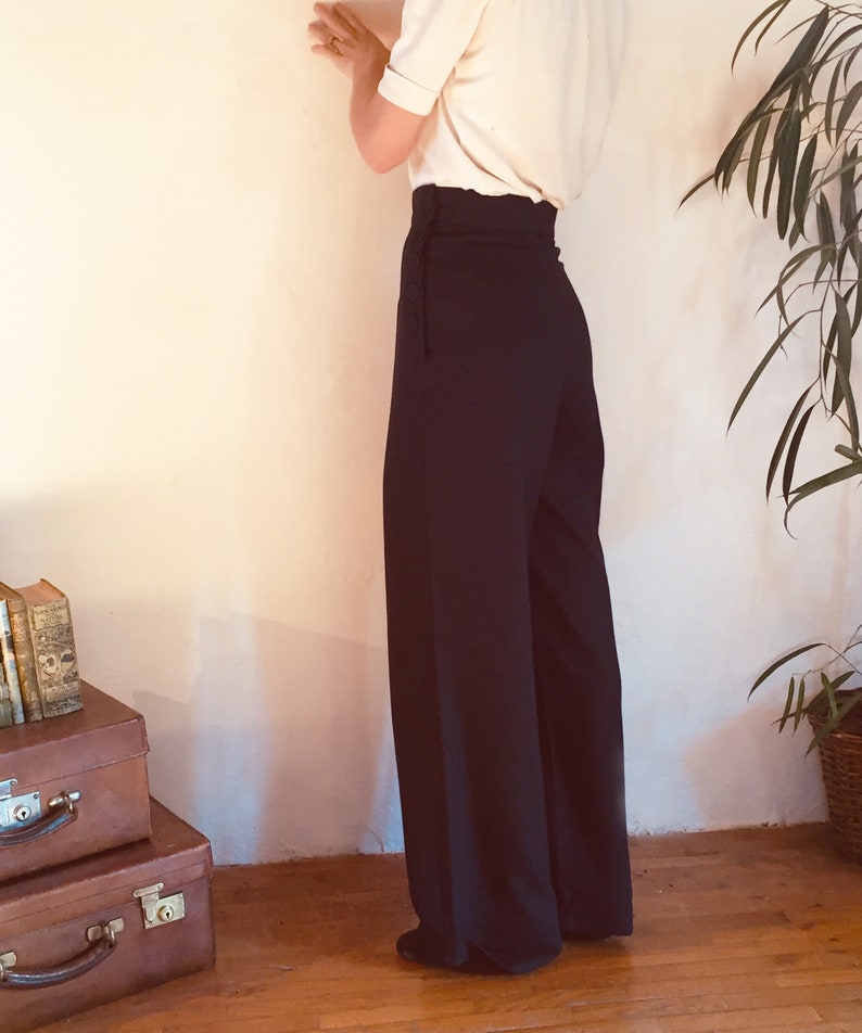 Chic 1940s style navy high waisted ladies wide leg trousers