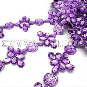 Finition lilas en strass