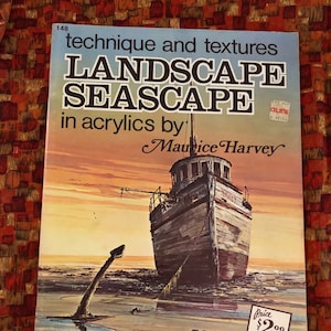 May include: A vintage book cover titled "Landscape Seascape" in acrylics by Maurice Harvey. The cover features a painting of a weathered boat on a beach at sunset. The book is a Walter T. Foster Publication.