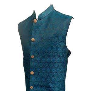 Steampunk turquoise brocade high neck waistcoat with pockets .