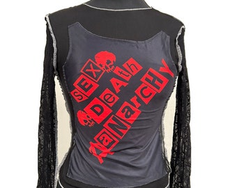Top elasticizzato in rete nera gotica Halloween con maniche a ragnatela S