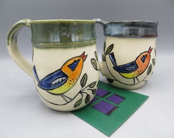 Taza; Taza de cerámica tallada; Taza con hojas; Taza con pájaro