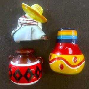 May include: A rustic wooden sign with the text "Welcome to our home" in white lettering. The sign features a distressed finish and a simple, inviting design, perfect for front door decor.