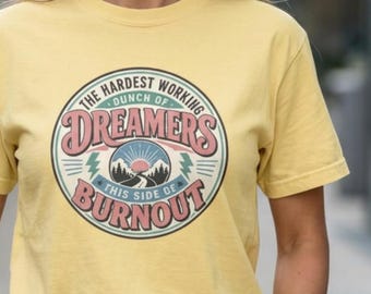 The Hardest Working Dreamers Graphic T-Shirt | Retro Sunset Mountain Illustration