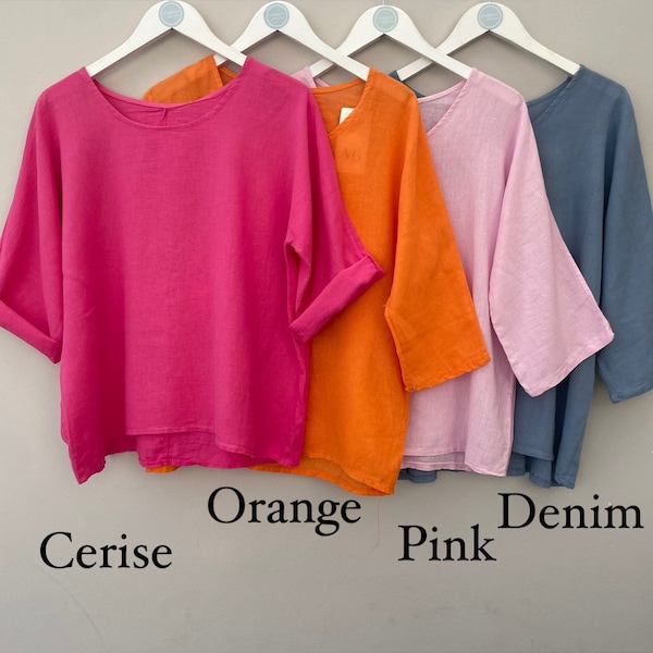 Top de mezcla de lino y algodón: Blusa de corte recto con mangas tres cuartos.