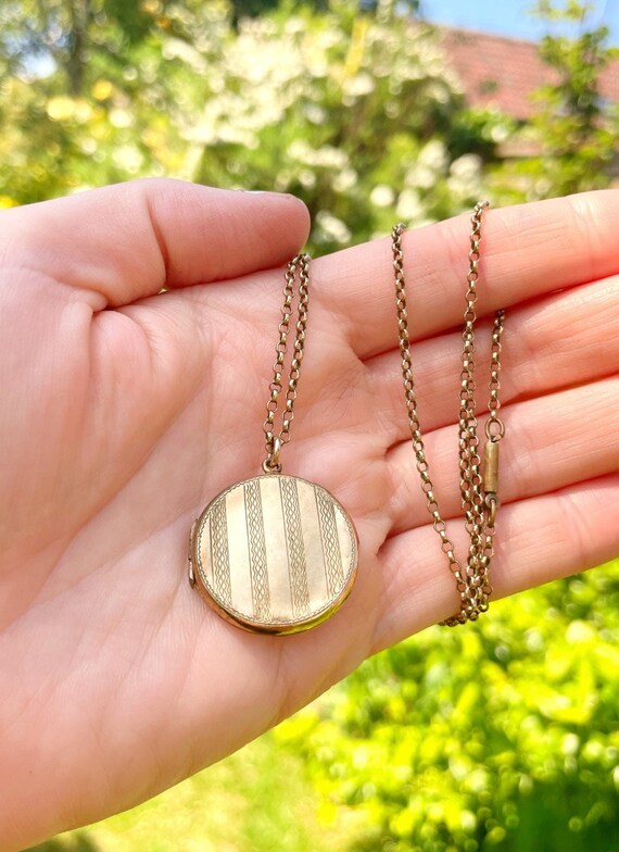 Rolled on sale gold locket