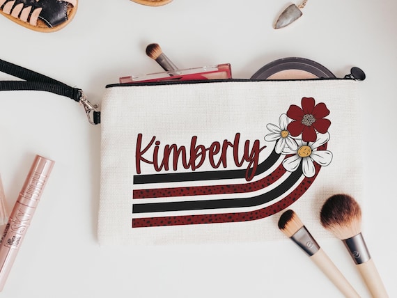 Personalized maroon daisy wristlet with strap