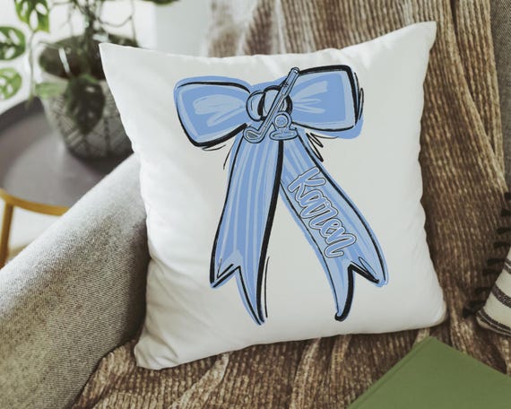 Personalized columbia blue bow name golf pillows