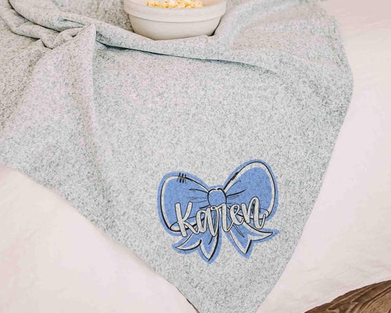 Personalized carolina blue coquette bow name blanket