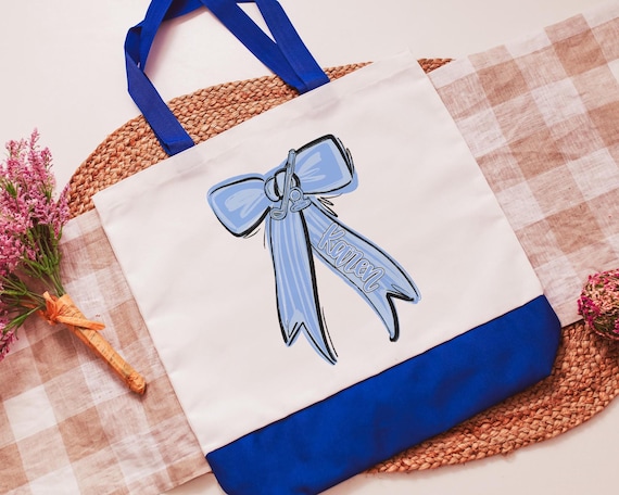 Personalized golf bow with name tote bag