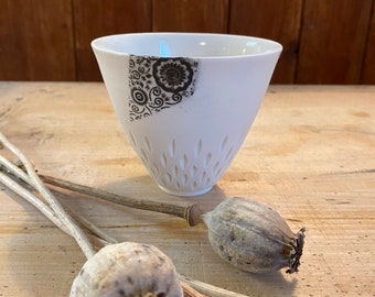 Porcelain mug with floral decoration