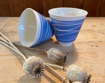 Blue striped porcelain mug