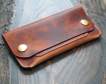 Trucker-style snap wallet in Italian Badalassi Wax Cognac leather, cards and cash, brass snaps. Vegtan leather wallet handmade in the UK.