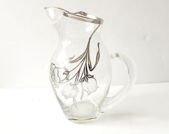 Cambridge glazen kan met zilveren deksel en roosbloem